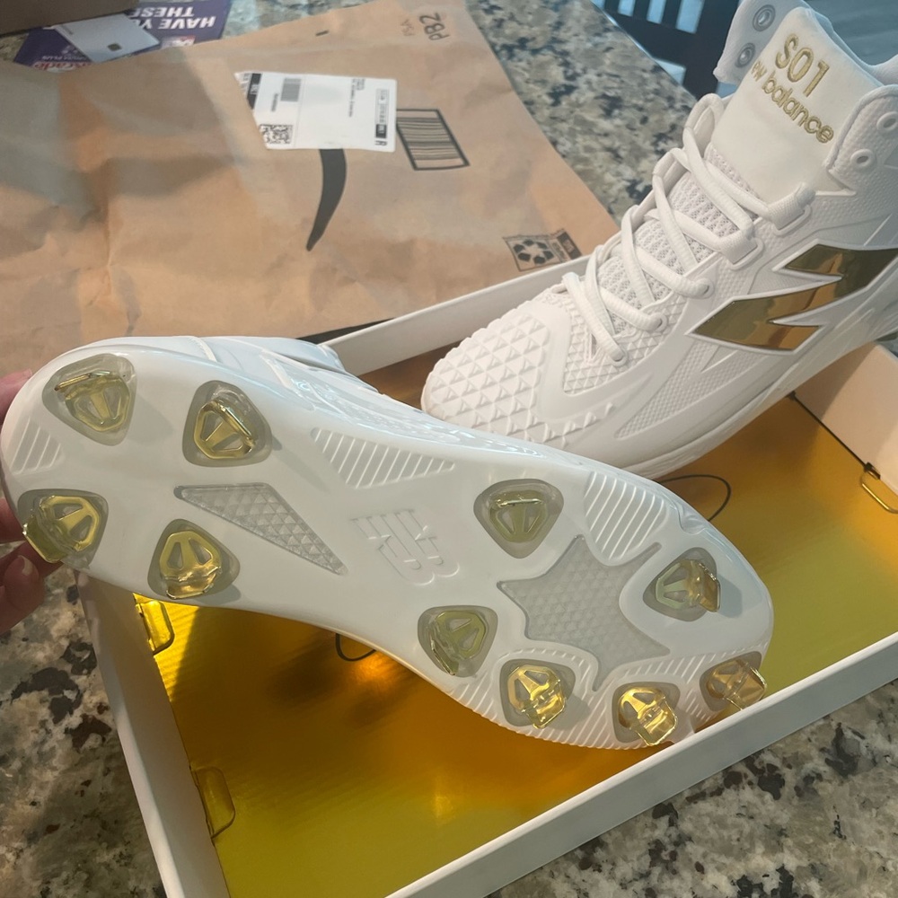 New balance metal cleats